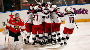 SUNRISE, FL - JANUARY 5: Seth Jones #3 of the Columbus Blue Jackets is swarmed by teammates after his over time goal for the win against the Florida Panthers at the BB&T Center on January 5, 2019 in Sunrise, Florida. (Photo by Eliot J. Schechter/NHLI via Getty Images)