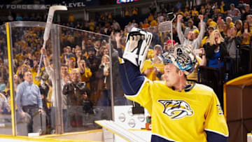 NASHVILLE, TN - FEBRUARY 22: Pekka Rinne #35 of the Nashville Predators acknowledges the fans applause on his 300th career win after a 7-1 victory against the San Jose Sharks during an NHL game at Bridgestone Arena on February 22, 2018 in Nashville, Tennessee. (Photo by John Russell/NHLI via Getty Images)