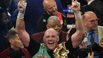 British boxer Tyson Fury celebrates after defeating US boxer Deontay Wilder in the seventh round during their World Boxing Council (WBC) Heavyweight Championship Title boxing match at the MGM Grand Garden Arena in Las Vegas on February 22, 2020. (Photo by Mark RALSTON / AFP) (Photo by MARK RALSTON/AFP via Getty Images)