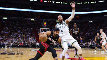Gabe Vincent #2 of the Miami Heat drives against Jevon Carter #5 of the Milwaukee Bucks(Photo by Megan Briggs/Getty Images)