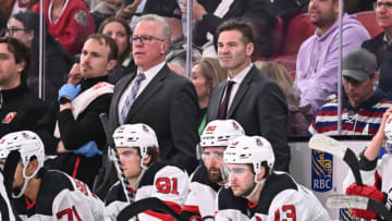 MONTREAL, CANADA - MARCH 11: (L-R) Assistant coaches Ryan McGill and Chris Taylor work the bench during the third period against the Montreal Canadiens at Centre Bell on March 11, 2023 in Montreal, Quebec, Canada. The New Jersey Devils defeated the Montreal Canadiens 3-1. Photo by Minas Panagiotakis/Getty Images)