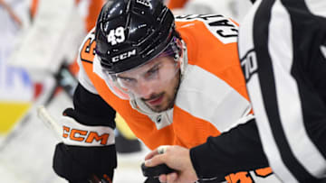 Mar 28, 2023; Philadelphia, Pennsylvania, USA; Philadelphia Flyers left wing Noah Cates (49) during face-off against the Montreal Canadiens at Wells Fargo Center. Mandatory Credit: Eric Hartline-USA TODAY Sports