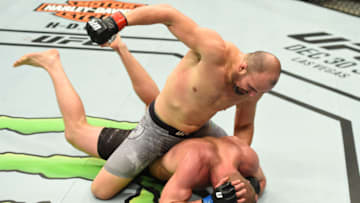 WINNIPEG, CANADA - DECEMBER 16: Glover Teixeira of Brazil (top) punches Misha Cirkunov of Latvia in their light heavyweight bout during the UFC Fight Night event at Bell MTS Place on December 16, 2017 in Winnipeg, Manitoba, Canada. (Photo by Josh Hedges/Zuffa LLC/Zuffa LLC via Getty Images)