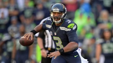 Sep 11, 2016; Seattle, WA, USA; Seattle Seahawks quarterback Russell Wilson (3) throws a pass against the Miami Dolphins during a NFL game at CenturyLink Field. The Seahawks defeated the Dolphins 12-10. Mandatory Credit: Kirby Lee-USA TODAY Sports