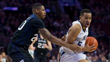 PHILADELPHIA, PA - MARCH 02: Phil Booth #5 of the Villanova Wildcats drives to the basket against Henry Baddley #20 of the Butler Bulldogs in the second half at the Wells Fargo Center on March 2, 2019 in Philadelphia, Pennsylvania. Villanova defeated Butler 75-54. (Photo by Mitchell Leff/Getty Images)