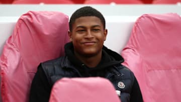 LIVERPOOL, ENGLAND - AUGUST 17: Rhian Brewster of Liverpool looks on from the dugout during the Premier League 2 match between Liverpool at Tottenham Hotspur at Anfield on August 17, 2018 in Liverpool, England. (Photo by Jan Kruger/Getty Images)