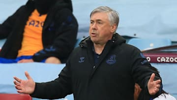 Everton's Italian head coach Carlo Ancelotti gestures on the touchline during the English Premier League football match between Aston Villa and Everton at Villa Park in Birmingham, central England on May 13, 2021. - RESTRICTED TO EDITORIAL USE. No use with unauthorized audio, video, data, fixture lists, club/league logos or 'live' services. Online in-match use limited to 120 images. An additional 40 images may be used in extra time. No video emulation. Social media in-match use limited to 120 images. An additional 40 images may be used in extra time. No use in betting publications, games or single club/league/player publications. (Photo by Lindsey Parnaby / POOL / AFP) / RESTRICTED TO EDITORIAL USE. No use with unauthorized audio, video, data, fixture lists, club/league logos or 'live' services. Online in-match use limited to 120 images. An additional 40 images may be used in extra time. No video emulation. Social media in-match use limited to 120 images. An additional 40 images may be used in extra time. No use in betting publications, games or single club/league/player publications. / RESTRICTED TO EDITORIAL USE. No use with unauthorized audio, video, data, fixture lists, club/league logos or 'live' services. Online in-match use limited to 120 images. An additional 40 images may be used in extra time. No video emulation. Social media in-match use limited to 120 images. An additional 40 images may be used in extra time. No use in betting publications, games or single club/league/player publications. (Photo by LINDSEY PARNABY/POOL/AFP via Getty Images)