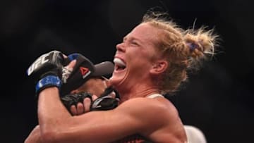 Nov 15, 2015; Melbourne, Australia; Holly Holm (blue gloves) celebrates after defeating Ronda Rousey (not pictured) during UFC 193 at Etihad Stadium. Mandatory Credit: Matt Roberts-USA TODAY Sports