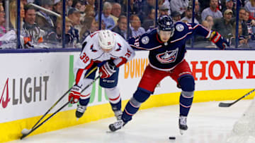 COLUMBUS, OH - APRIL 19: Alex Chiasson #39 of the Washington Capitals and Pierre-Luc Dubois #18 of the Columbus Blue Jackets battle for control of the puck in Game Four of the Eastern Conference First Round during the 2018 NHL Stanley Cup Playoffs on April 19, 2018 at Nationwide Arena in Columbus, Ohio. Washington defeated Columbus 4-1. (Photo by Kirk Irwin/Getty Images) *** Local Caption *** Alex Chiasson;Pierre-Luc Dubois