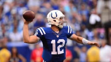 Sep 28, 2014; Indianapolis, IN, USA; Indianapolis Colts quarterback Andrew Luck (12) looks to pass during the third quarter against the Tennessee Titans at Lucas Oil Stadium. Mandatory Credit: Andrew Weber-USA TODAY Sports