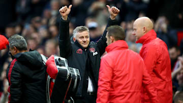 MANCHESTER, ENGLAND - DECEMBER 26: Ole Gunnar Solskjaer, Interim Manager of Manchester United acknowledges the fans as he walks out on to the pitch prior to the start of the Premier League match between Manchester United and Huddersfield Town at Old Trafford on December 26, 2018 in Manchester, United Kingdom. (Photo by Clive Brunskill/Getty during the Premier League match between Manchester United and Huddersfield Town at Old Trafford on December 26, 2018 in Manchester, United Kingdom. (Photo by Clive Brunskill/Getty Images)