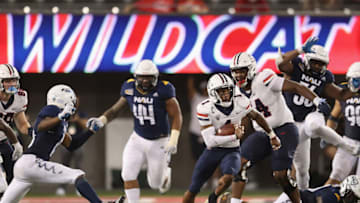 TUCSON, ARIZONA - SEPTEMBER 18: Wide receiver Stanley Berryhill III #1 of the Arizona Wildcats runs with the football against the Northern Arizona Lumberjacks during the second half of the NCCAF game at Arizona Stadium on September 18, 2021 in Tucson, Arizona. The Lumberjacks defeated the Wildcats 21-19. (Photo by Christian Petersen/Getty Images)