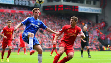 LIVERPOOL, ENGLAND - APRIL 27: Tomas Kalas of Chelsea controls the ball under pressure from Steven Gerrard of Liverpool during the Barclays Premier League match between Liverpool and Chelsea at Anfield on April 27, 2014 in Liverpool, England. (Photo by Clive Brunskill/Getty Images)