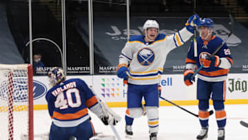 UNIONDALE, NEW YORK - FEBRUARY 22: Casey Mittelstadt #37 of the Buffalo Sabres celebrates a goal by Curtis Lazar #27 at 17:15 of the first period against Semyon Varlamov #40 of the New York Islanders at the Nassau Coliseum on February 22, 2021 in Uniondale, New York. (Photo by Bruce Bennett/Getty Images)