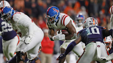 Auburn footballOct 30, 2021; Auburn, Alabama, USA; Mississippi Rebels running back Snoop Conner (24) carries the ball against Auburn Tigers safety Zion Puckett (10) during the third quarter at Jordan-Hare Stadium. Mandatory Credit: John Reed-USA TODAY Sports