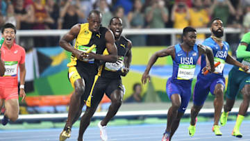 Jamaica's Usain Bolt takes off after taking the handoff from teammate Nickel Ashmeade for the last leg and another Olympic Gold Medal in the 4x100m relay Friday, August 19, 2016 at the Rio Games. (Mark Reis/Colorado Springs Gazette/TNS via Getty Images)