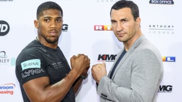 COLOGNE, GERMANY - FEBRUARY 16: Anthony Joshua and Wladimir Klitschko pose at the photocall during the press conference with Anthony Joshua and Wladimir Klitschko at RTL media group mall on February 16, 2017 in Cologne, Germany. (Photo by Alexander Scheuber/Bongarts/Getty Images)