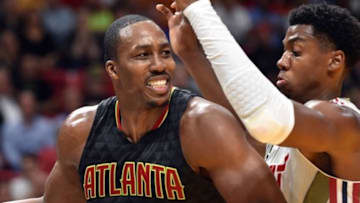 Nov 15, 2016; Miami, FL, USA; Atlanta Hawks center Dwight Howard (8) is pressured by Miami Heat center Hassan Whiteside (21) during the second half at American Airlines Arena. The Hawks won 93-90. Mandatory Credit: Steve Mitchell-USA TODAY Sports