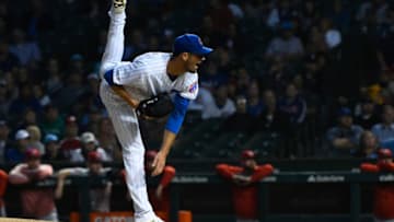 Sep 16, 2019; Chicago, IL, USA; Chicago Cubs starting pitcher Cole Hamels (35) delivers against the Cincinnati Reds in the first inning at Wrigley Field. Mandatory Credit: Matt Marton-USA TODAY Sports