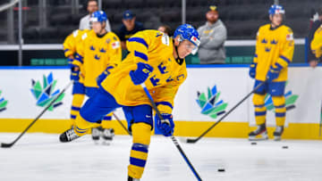 EDMONTON, AB - AUGUST 20: Emil Andrae #4 of Sweden takes part in the pre-game warm up prior to action against Czechia during the 2022 IIHF World Junior Championship bronze medal game at Rogers Place on August 20, 2022 in Edmonton, Alberta, Canada. (Photo by Andy Devlin/Getty Images)