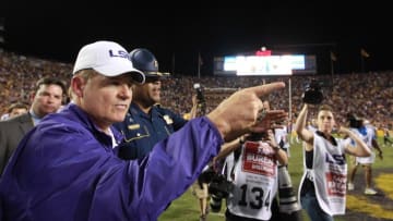 Nov 28, 2015; Baton Rouge, LA, USA; LSU Tigers head coach Les Miles talks with a referee during the second half at Tiger Stadium. LSU defeated Texas A&M Aggies 19-7. Mandatory Credit: Crystal LoGiudice-USA TODAY Sports