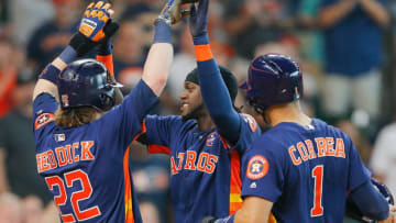 HOUSTON, TX - SEPTEMBER 03: Cameron Maybin #3 of the Houston Astros is congratulated by Carlos Correa #1 and Josh Reddick #22 after hitting a home run in the third inning against the New York Mets at Minute Maid Park on September 3, 2017 in Houston, Texas. (Photo by Bob Levey/Getty Images)