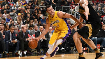 TORONTO, CANADA - JANUARY 28: Larry Nance Jr. #7 of the Los Angeles Lakers handles the ball against the Toronto Raptors on January 28, 2018 at the Air Canada Centre in Toronto, Ontario, Canada. NOTE TO USER: User expressly acknowledges and agrees that, by downloading and or using this Photograph, user is consenting to the terms and conditions of the Getty Images License Agreement. Mandatory Copyright Notice: Copyright 2018 NBAE (Photo by Ron Turenne/NBAE via Getty Images)