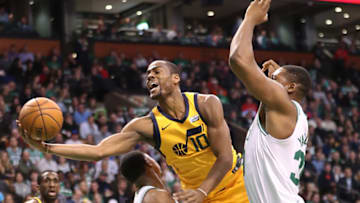 BOSTON - DECEMBER 15: Boston Celtics' Marcus Smart picks up a charging foul on Utah Jazz's Alec Burks during the second quarter. The Boston Celtics host the Utah Jazz in a regular season NBA basketball game at TD Garden in Boston on Dec. 15, 2017. (Photo by Matthew J. Lee/The Boston Globe via Getty Images)