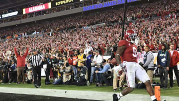 Jan 9, 2017; Tampa, FL, USA; Alabama Crimson Tide running back Bo Scarbrough (9) scores a touchdown during the second quarter against the Clemson Tigers in the 2017 College Football Playoff National Championship Game at Raymond James Stadium. Mandatory Credit: John David Mercer-USA TODAY Sports