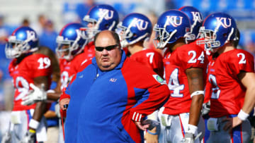 LAWRENCE, KS - SEPTEMBER 26: Head coach Mark Mangino of the Kansas Jayhawks watches during warm-ups just prior to the start of the game against the Southern Mississippi Golden Eagles on September 26, 2009 at Memorial Stadium in Lawrence, Kansas. (Photo by Jamie Squire/Getty Images)