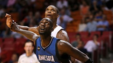 MIAMI, FL - NOVEMBER 17: Kevin Garnett #21 of the Minnesota Timberwolves boxes out Chris Bosh #1 of the Miami Heat during a game at American Airlines Arena on November 17, 2015 in Miami, Florida. NOTE TO USER: User expressly acknowledges and agrees that, by downloading and/or using this photograph, user is consenting to the terms and conditions of the Getty Images License Agreement. Mandatory copyright notice: (Photo by Mike Ehrmann/Getty Images)
