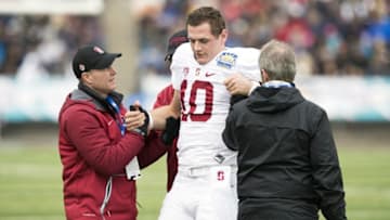 Dec 30, 2016; El Paso, TX, USA; Stanford Cardinal quarterback Keller Chryst (10) is injured after running the ball against the North Carolina Tar Heels defense at Sun Bowl Stadium. Mandatory Credit: Ivan Pierre Aguirre-USA TODAY Sports