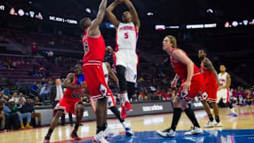 Oct 7, 2014; Auburn Hills, MI, USA; Detroit Pistons guard Kentavious Caldwell-Pope (5) shoots on Chicago Bulls center Nazr Mohammed (48) and forward Cameron Bairstow (41) in the second half at The Palace of Auburn Hills. Detroit won 111-109 in overtime. Mandatory Credit: Rick Osentoski-USA TODAY Sports