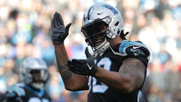 CHARLOTTE, NC - DECEMBER 24: Julius Peppers #90 of the Carolina Panthers reacts after a play against the Tampa Bay Buccaneers during their game at Bank of America Stadium on December 24, 2017 in Charlotte, North Carolina. (Photo by Streeter Lecka/Getty Images)
