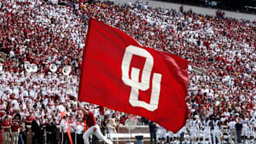 NORMAN, OK - OCTOBER 3: A member of the Oklahoma Sooners spirit squad celebrates a touchdown against the West Virginia Mountaineers October 3, 2015 at Gaylord Family-Oklahoma Memorial Stadium in Norman, Oklahoma. Oklahoma defeated West Virginia 44-24.(Photo by Brett Deering/Getty Images)