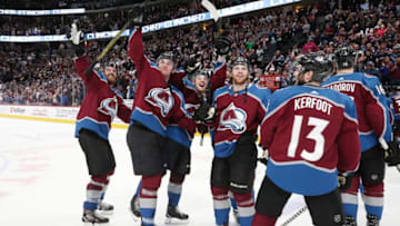 DENVER, CO - APRIL 07: Patrik Nemeth #12, Mikko Rantanen #96, Tyson Jost #17 and J.T. Compher #37 of the Colorado Avalanche wave to the crowd after a win against the St. Louis Blues at the Pepsi Center on April, 7, 2018 in Denver, Colorado. The Avalanche defeated the Blues 5-2. (Photo by Michael Martin/NHLI via Getty Images)