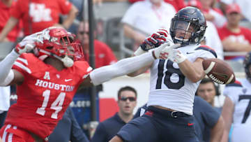 HOUSTON, TX - SEPTEMBER 8: Isaiah Johnson #14 of the Houston Cougars breaks up a pass intended for Cedric Peterson #18 of the Arizona Wildcats in the first quarter at TDECU Stadium on September 8, 2018 in Houston, Texas. (Photo by Thomas B. Shea/Getty Images)
