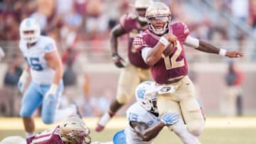 TALLAHASSEE, FL - OCTOBER 01: Donnie Miles #15 of the North Carolina Tar Heels attempts to tackle Deondre Francois #12 of the Florida State Seminoles at Doak Campbell Stadium on October 1, 2016 in Tallahassee, Florida. (Photo by Jeff Gammons/Getty Images)