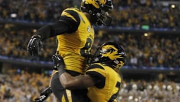 Jan 3, 2014; Arlington, TX, USA; Missouri Tigers wide receiver Marcus Lucas (85) celebrates scoring a touchdown with running back Henry Josey (20) in the second quarter Oklahoma State Cowboys at the 2014 Cotton Bowl at AT&T Stadium. Mandatory Credit: Tim Heitman-USA TODAY Sports