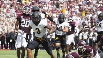 Sep 10, 2022; College Station, Texas, USA; Appalachian State Mountaineers running back Ahmani Marshall (3) celebrates his touchdown run with teammates against the Texas A&M Aggies in the second quarter at Kyle Field. Mandatory Credit: Thomas Shea-USA TODAY Sports