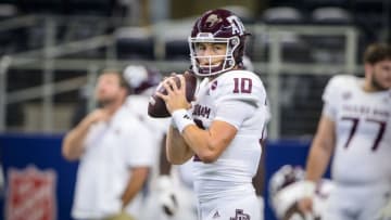 Auburn footballSep 25, 2021; Arlington, Texas, USA; Texas A&M Aggies quarterback Zach Calzada (10) warms up before the game between the Arkansas Razorbacks and the Texas A&M Aggies at AT&T Stadium. Mandatory Credit: Jerome Miron-USA TODAY Sports