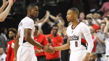 May 9, 2016; Portland, OR, USA; Portland Trail Blazers forward Maurice Harkless (4) congratulates guard Damian Lillard (0) after making a basket over Golden State Warriors in game four of the second round of the NBA Playoffs at Moda Center at the Rose Quarter. Mandatory Credit: Jaime Valdez-USA TODAY Sports