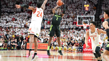COLLEGE PARK, MD - FEBRUARY 29: Rocket Watts #2 of the Michigan State Spartans takes a jump shot over Donta Scott #24 of the Maryland Terrapins during a college basketball game at the Xfinity Center on February 29, 2020 in College Park, Maryland. (Photo by Mitchell Layton/Getty Images)