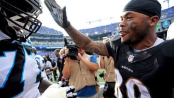 Sep 28, 2014; Baltimore, MD, USA; Baltimore Ravens wide receiver Steve Smith, Sr. (89) high fives Carolina Panthers offensive tackle Byron Bell (77) their game at M&T Bank Stadium. The Ravens won 38-10. Mandatory Credit: Evan Habeeb-USA TODAY Sports