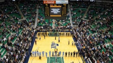 Dec 15, 2012; Salt Lake City, UT, USA; Players, coaches and fans observe a moment of silence to honor the victims of the Sandy Hook Elementary School shooting prior to a game between the Utah Jazz and the Memphis Grizzlies at EnergySolutions Arena. Mandatory Credit: Russ Isabella-USA TODAY Sports