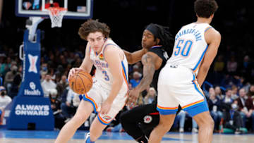 Thunder guard Josh Giddey (3) drives to the basket around LA Clippers guard Terance Mann (14) : Alonzo Adams-USA TODAY Sports