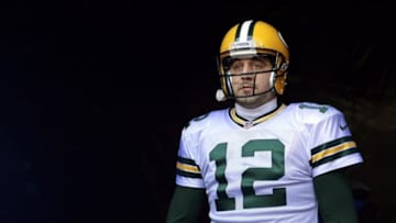Dec 29, 2013; Chicago, IL, USA; Green Bay Packers quarterback Aaron Rodgers (12) takes the field before the game against the Chicago Bears at Soldier Field. Mandatory Credit: Mike DiNovo-USA TODAY Sports