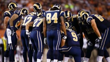 Aug 23, 2014; Cleveland, OH, USA; St. Louis Rams quarterback Austin Davis (9) calls a play against the Cleveland Browns at FirstEnergy Stadium. Mandatory Credit: Rick Osentoski-USA TODAY Sports
