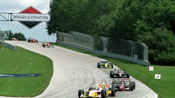 20 Aug 2000: Kenny Brack of Sweden who drives a Ford Reynard 2KI for Team Rahal leads the pack out of a turn during the Motorola 220, part of the 2000 CART FedEx Championship Series at Road America in Elkhart Lake, Wisconsin.Mandatory Credit: Jon Ferrey /Allsport