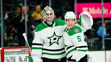 Jan 16, 2023; Las Vegas, Nevada, USA; Dallas Stars defensemen Nils Lundkvist (5) and goaltender Jake Oettinger (29) celebrate after defeating the Vegas Golden Knights 4-0 at T-Mobile Arena. Mandatory Credit: Lucas Peltier-USA TODAY Sports